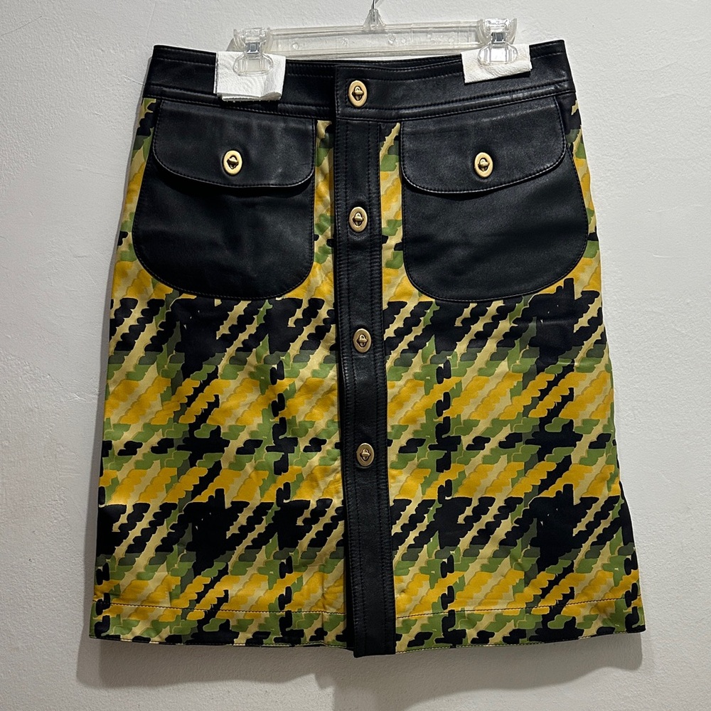 Coach genuine leather skirt with classic coach trunlocks in brushed gold- NWOT